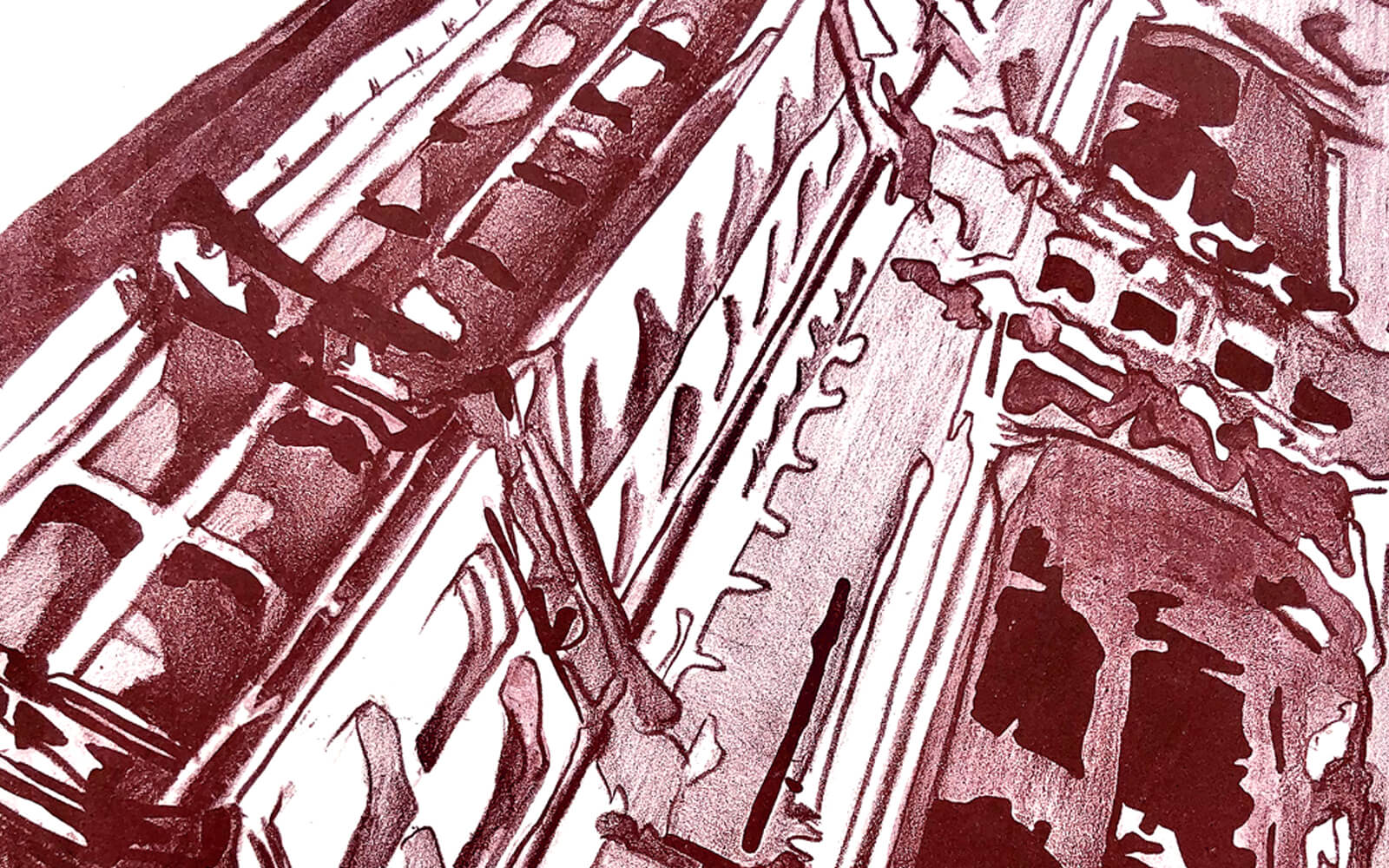 Detail of the facade engraving artwork in crimson colors