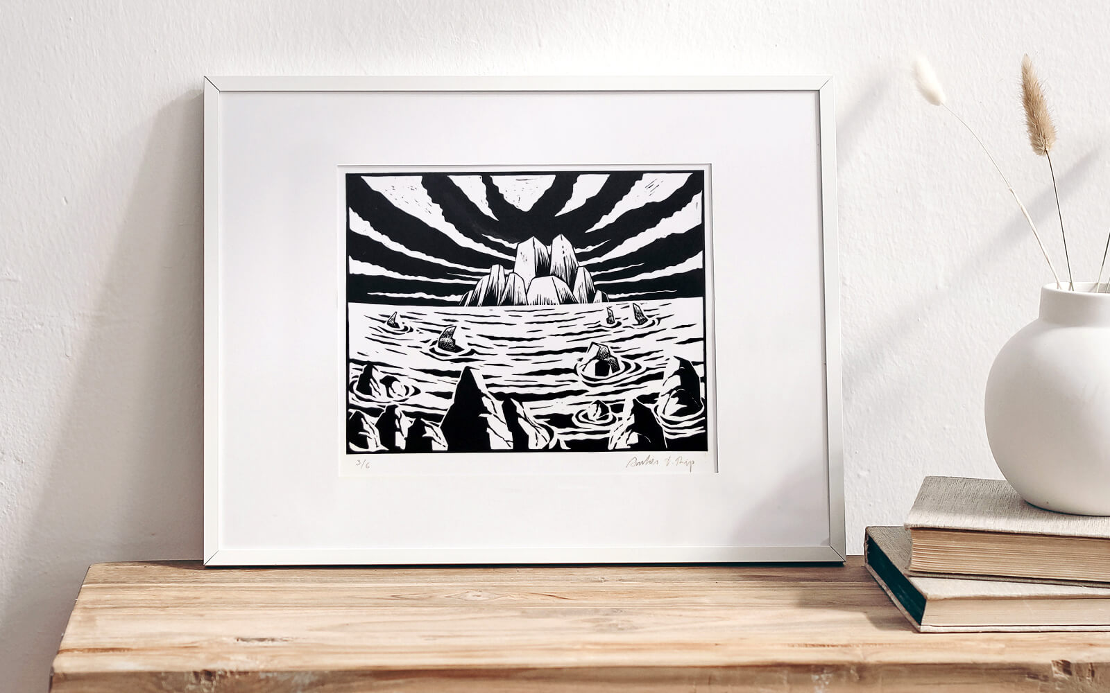 Mockup of the artwork showing the seascape in a white frame placed at home
