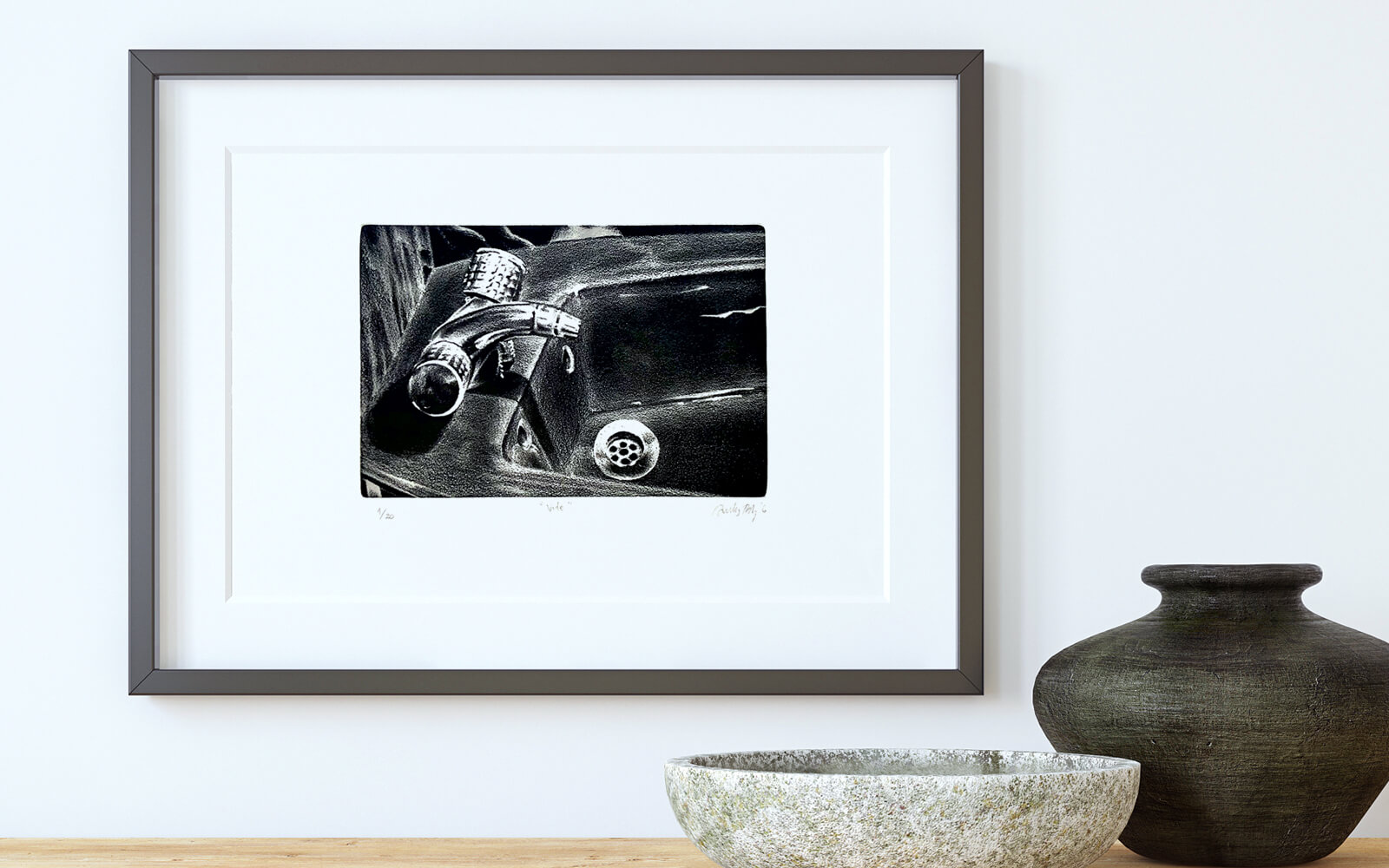 Mockup of the print in a grey frame, color that suits perfect with the black and white drawing of the bidet